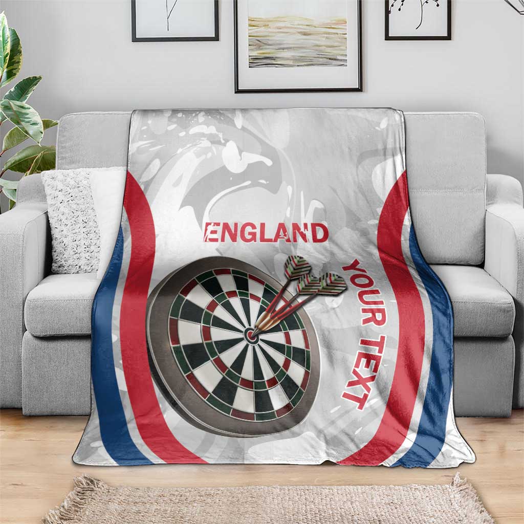 White England darts blanket draped over sofa with dartboard and red England title
