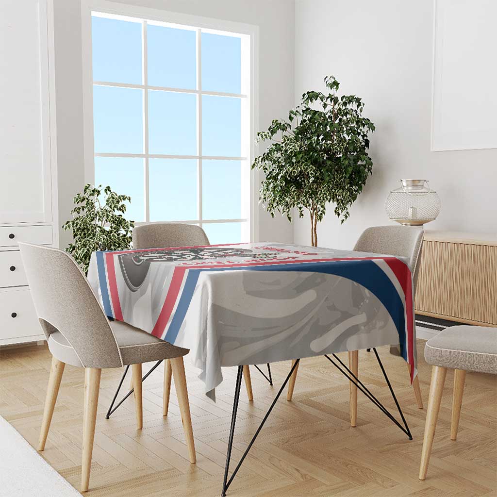 England darts tablecloth draped over dining table, dartboard and patriotic stripe design