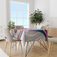 England darts tablecloth draped over dining table, dartboard and patriotic stripe design