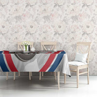 England darts tablecloth on dining table with dartboard and red, white, blue stripe artwork