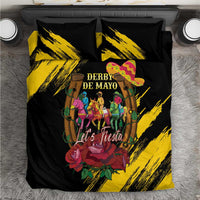 Black bedding set with yellow brushstroke pattern and Derby de Mayo “Let’s Fiesta” graphic