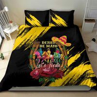 Black bedding set with yellow brushstroke accents and “Let’s Fiesta” graphic centerpiece