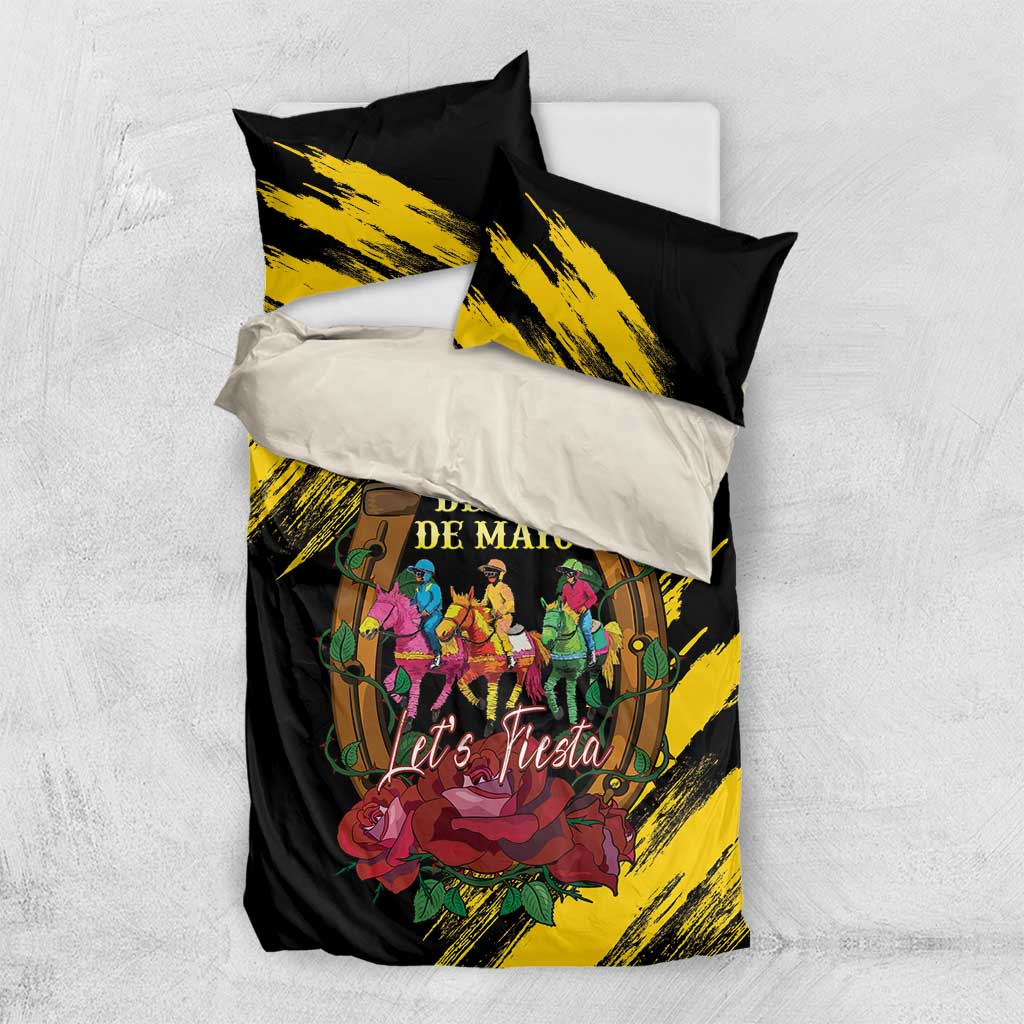 Black and yellow bedding set with printed “Derby de Mayo” text and “Let’s Fiesta” design
