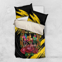 Black and yellow bedding set with printed “Derby de Mayo” text and “Let’s Fiesta” design