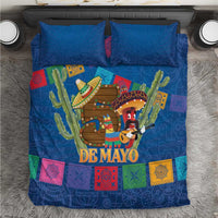 Blue Cinco de Mayo bedding set with two pillows, sombrero figures, cacti, and 'DE MAYO'