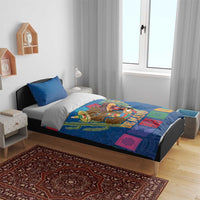 Blue bedding set with two pillows, 'DE MAYO' blanket design, colorful festival squares