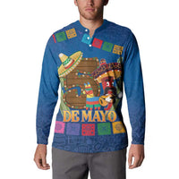Blue button sweatshirt worn by model, 'De Mayo' front graphic, long sleeves