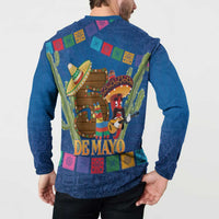 Blue button sweatshirt worn by model, back graphic with 'De Mayo' banner