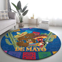 Round blue De Mayo fiesta carpet with mariachi and sombrero characters, colorful patterns