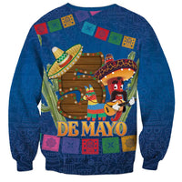 Blue long-sleeve sweatshirt featuring Cinco de Mayo themed front graphic and text