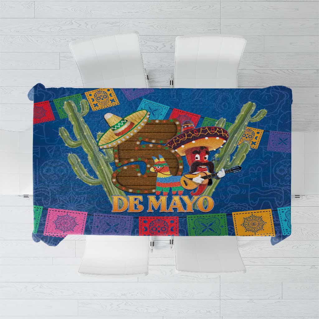 Blue Cinco de Mayo tablecloth with colorful banner, cacti, and festive figures
