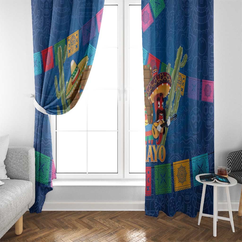 Blue window curtains with colorful cactus and “DE MAYO” character graphic on panel.