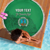 Round green blanket with white fringe, 'YOUR TEXT' and a football emblem in the center.