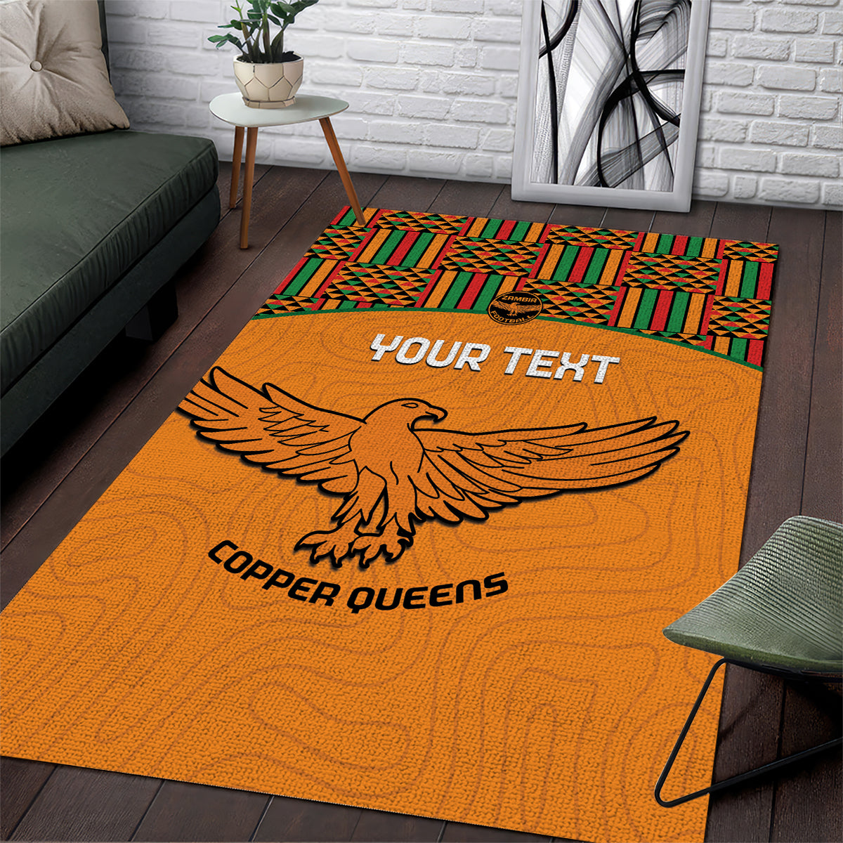 Orange area rug with Kente border, eagle and 'YOUR TEXT'/'COPPER QUEENS'