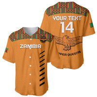 Orange football jersey set: front shows ZAMBIA; back shows Kente yoke, 14, Copper Queens