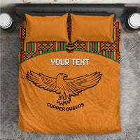 Orange football bedding set with two pillows, Kente stripes, and bird emblem graphic