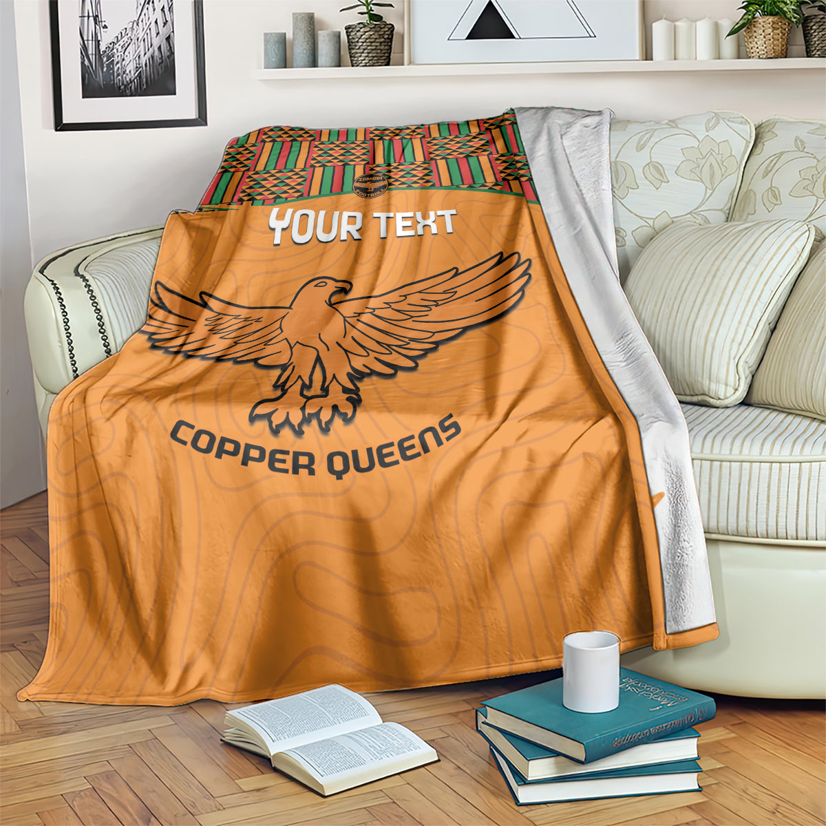 Orange football blanket with Kente-style patch panel, eagle graphic, and Custom text