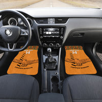 Pair of orange front car mats with Kente trim, eagle graphic, 'YOUR TEXT 14' and 'COPPER QUEENS'.