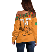 Orange off-shoulder sweater, back 'YOUR TEXT 14' and 'COPPER QUEENS' eagle