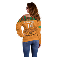 Orange off-shoulder sweater, back view 'YOUR TEXT 14' and 'COPPER QUEENS' lettering