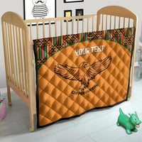 Orange quilt blanket with Kente border and eagle emblem, Copper Queens text
