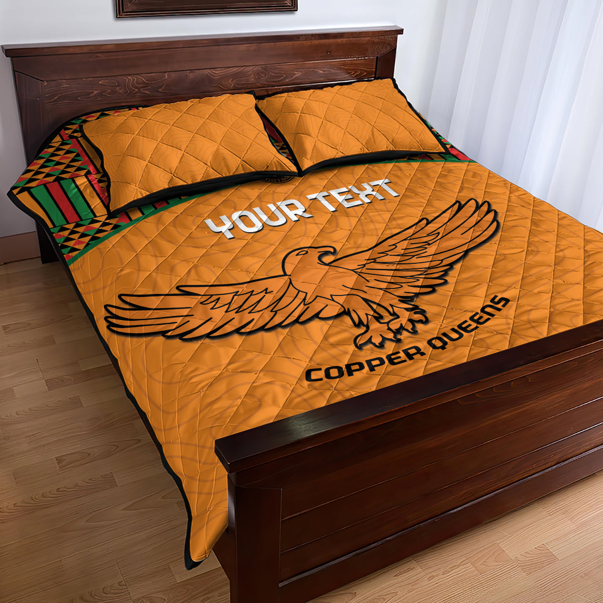 Orange football quilt bed set with eagle print and 'COPPER QUEENS', matching pillows