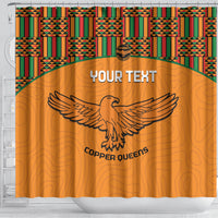 Orange shower curtain with kente band, custom text header, and Copper Queens eagle