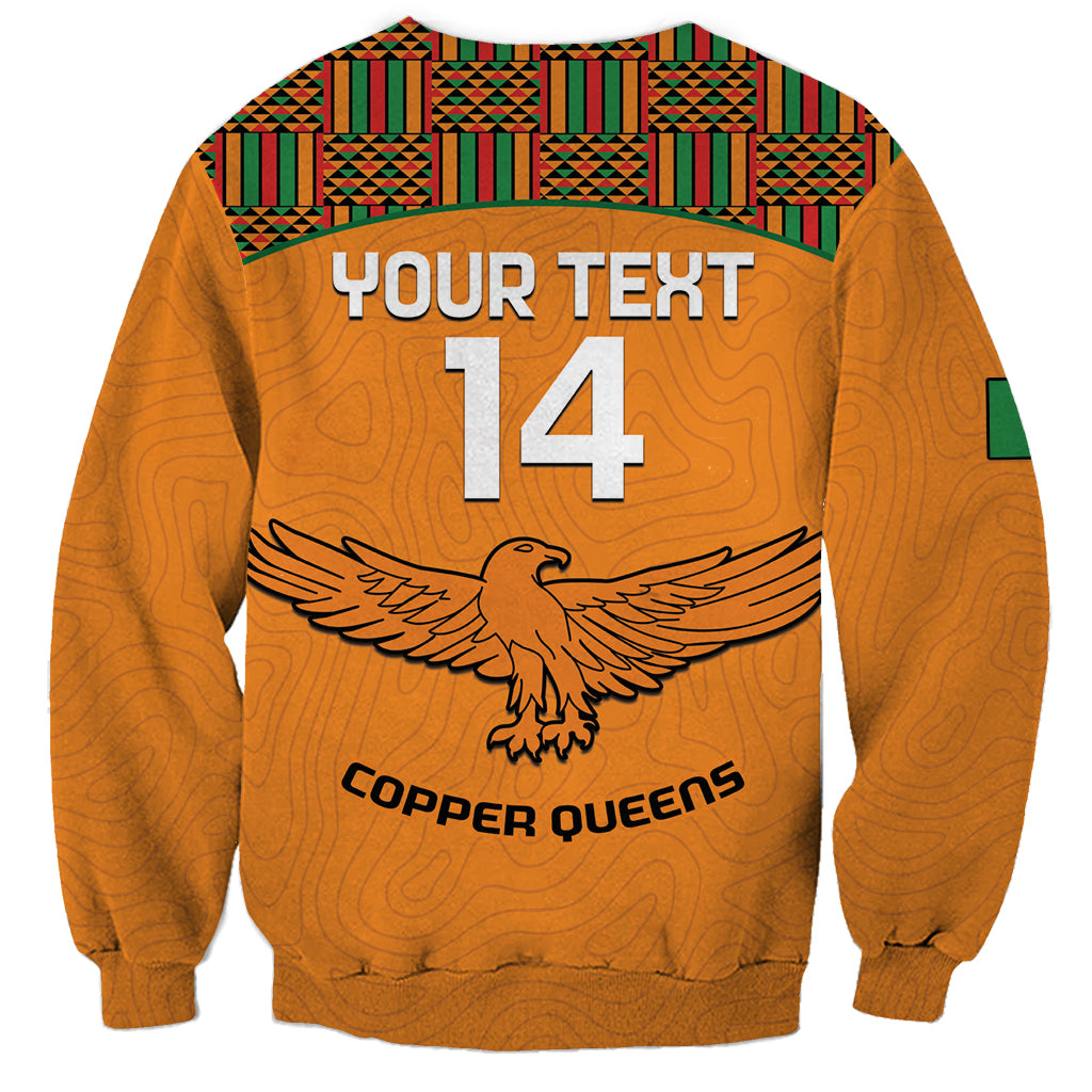 Orange crewneck football sweatshirt with kente back yoke, YOUR TEXT 14 and Copper Queens logo