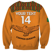 Orange crewneck football sweatshirt with kente back yoke, YOUR TEXT 14 and Copper Queens logo