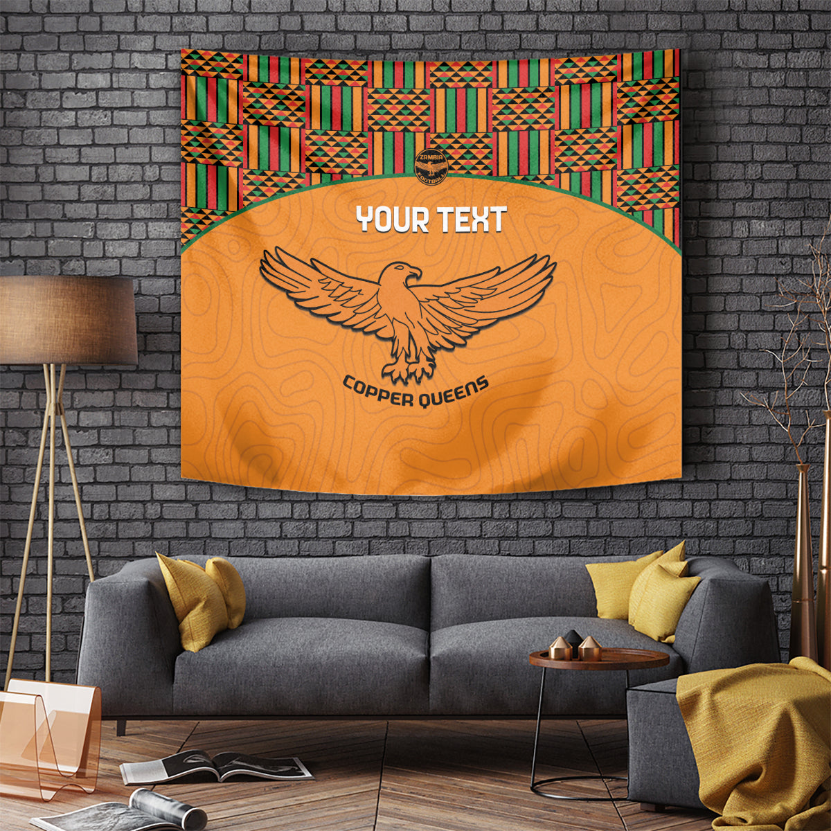 Orange football tapestry with kente border, eagle emblem, centered custom text