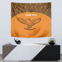 Orange football tapestry with kente-pattern border, eagle logo and custom text