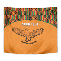 Orange football tapestry close-up with kente header, eagle logo and custom text