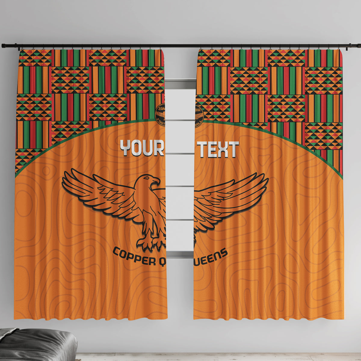 Orange football window curtain with kente-pattern top border and winged bird graphic
