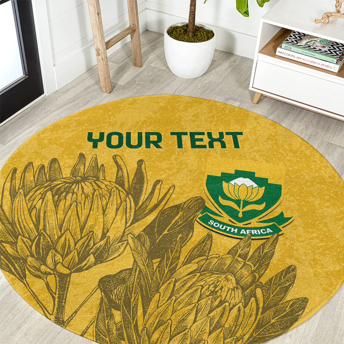 Yellow round soccer rug with 'YOUR TEXT' and South Africa emblem, leafy design.