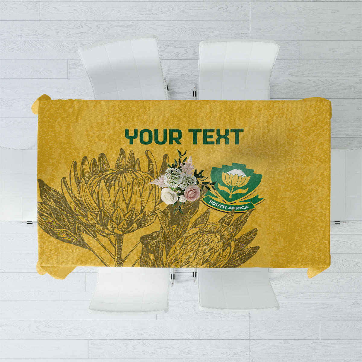 Yellow soccer-themed custom tablecloth with floral crest graphic, laid over square table
