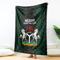 Nigeria Super Falcons blanket with centered team crest and white horses on green pattern