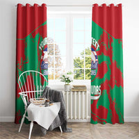 Red baseball curtains with green diagonal splatter print; top grommets on rod