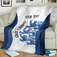 Draped blue and white throw blanket with lion crest, “YOUR TEXT,” and blue border