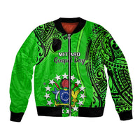 Green bomber jacket with black ribbed trim, zip front, tribal pattern, crest graphic