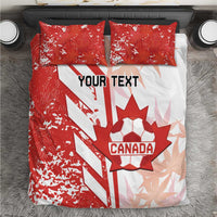 Top view red and white Canada soccer bedding set with “YOUR TEXT” on duvet and pillows