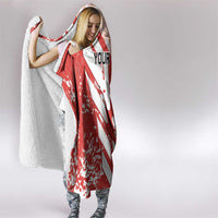 Hooded blanket in red and white Canada soccer design with custom text, draped like a cape.