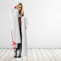 Fleece-lined hooded Canada soccer blanket, red and white design with Canada shield and text.