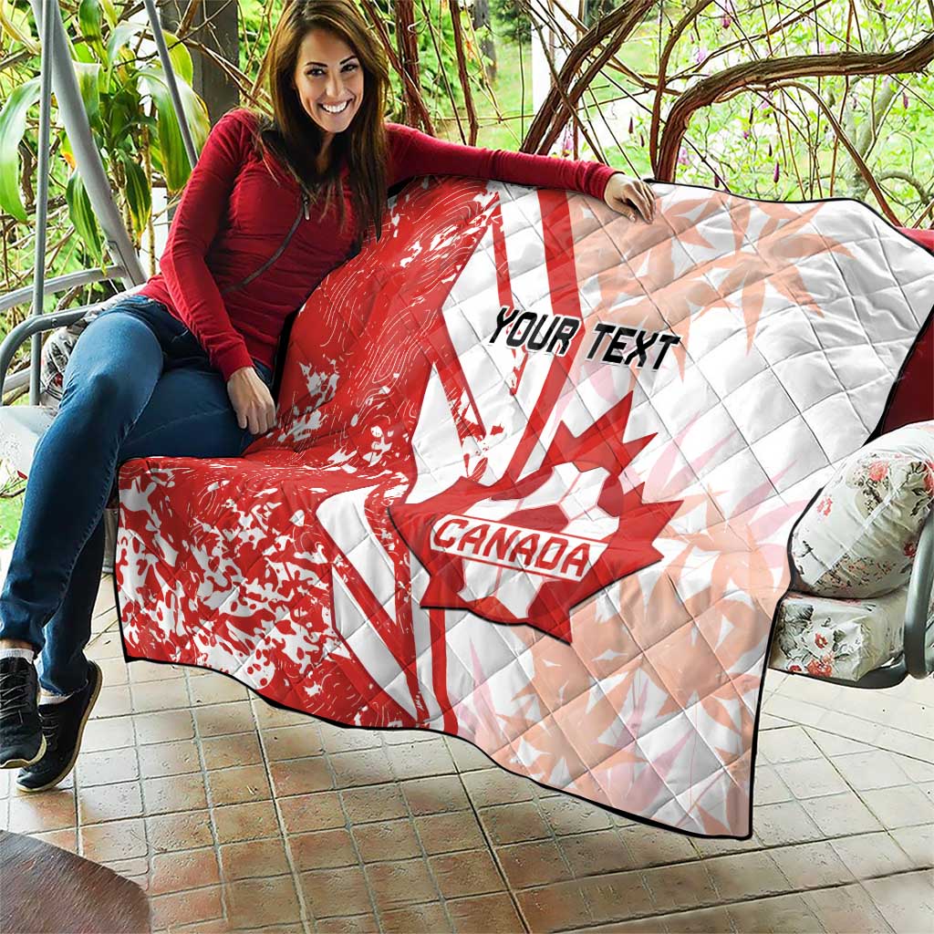 Red and white Canada soccer quilt spread on patio, featuring maple leaf and “Your Text”