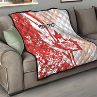 Red and white Canada soccer quilt folded on sofa, with maple leaf and “Your Text”