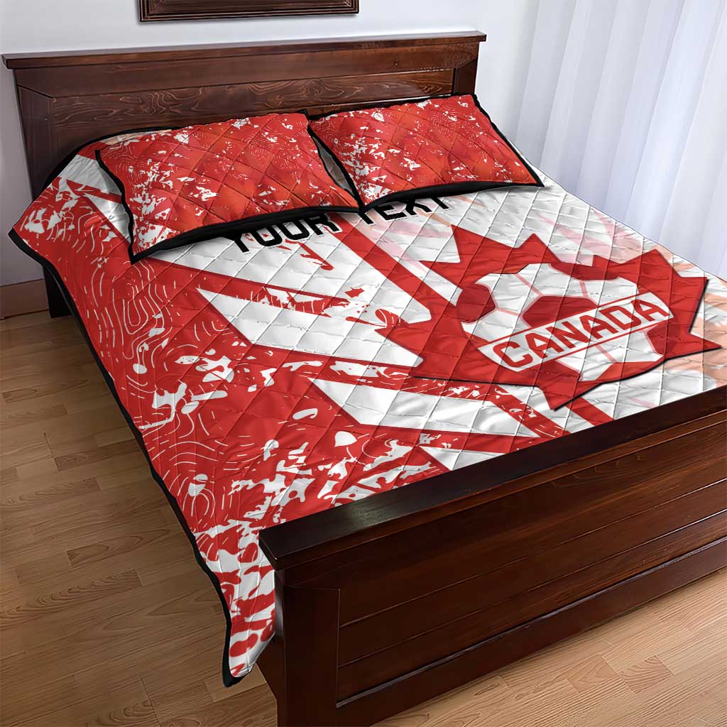 Red and white Canada quilt bed set with 2 pillow shams, large Canada logo patch.