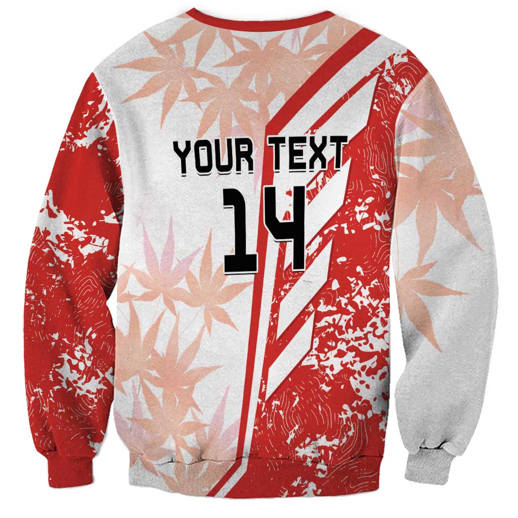 Red and white crewneck sweatshirt with long sleeves and large '14' graphic