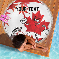 Round white Canada soccer beach blanket with red mascot and soccer ball, fringed edge