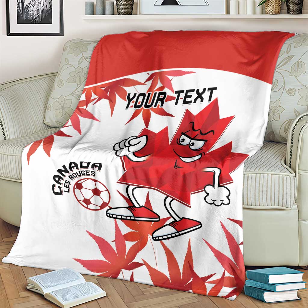 Canada soccer blanket on bed, red-and-white mascot with maple leaf and soccer ball print