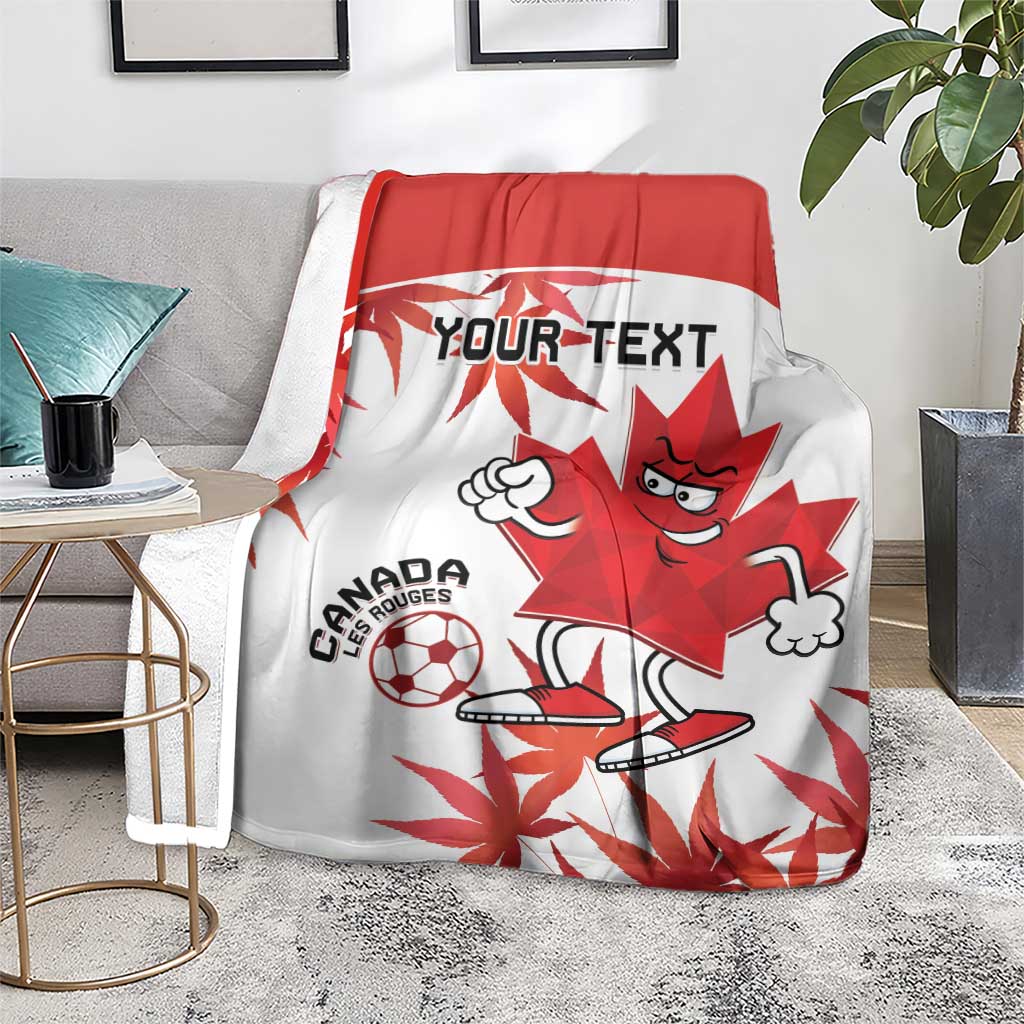 Canada soccer blanket on sofa, red-and-white mascot and maple leaf soccer print with custom text