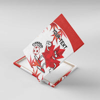 Angled view of red and white canvas wall art with Canada soccer mascot and custom text